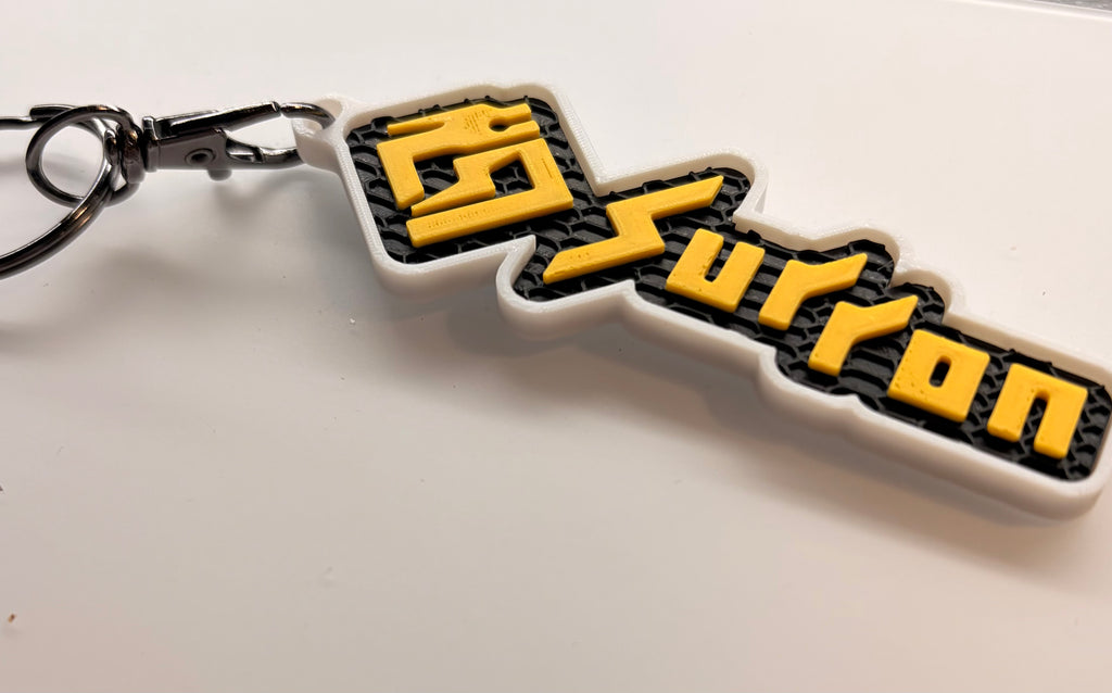 Surron keychain